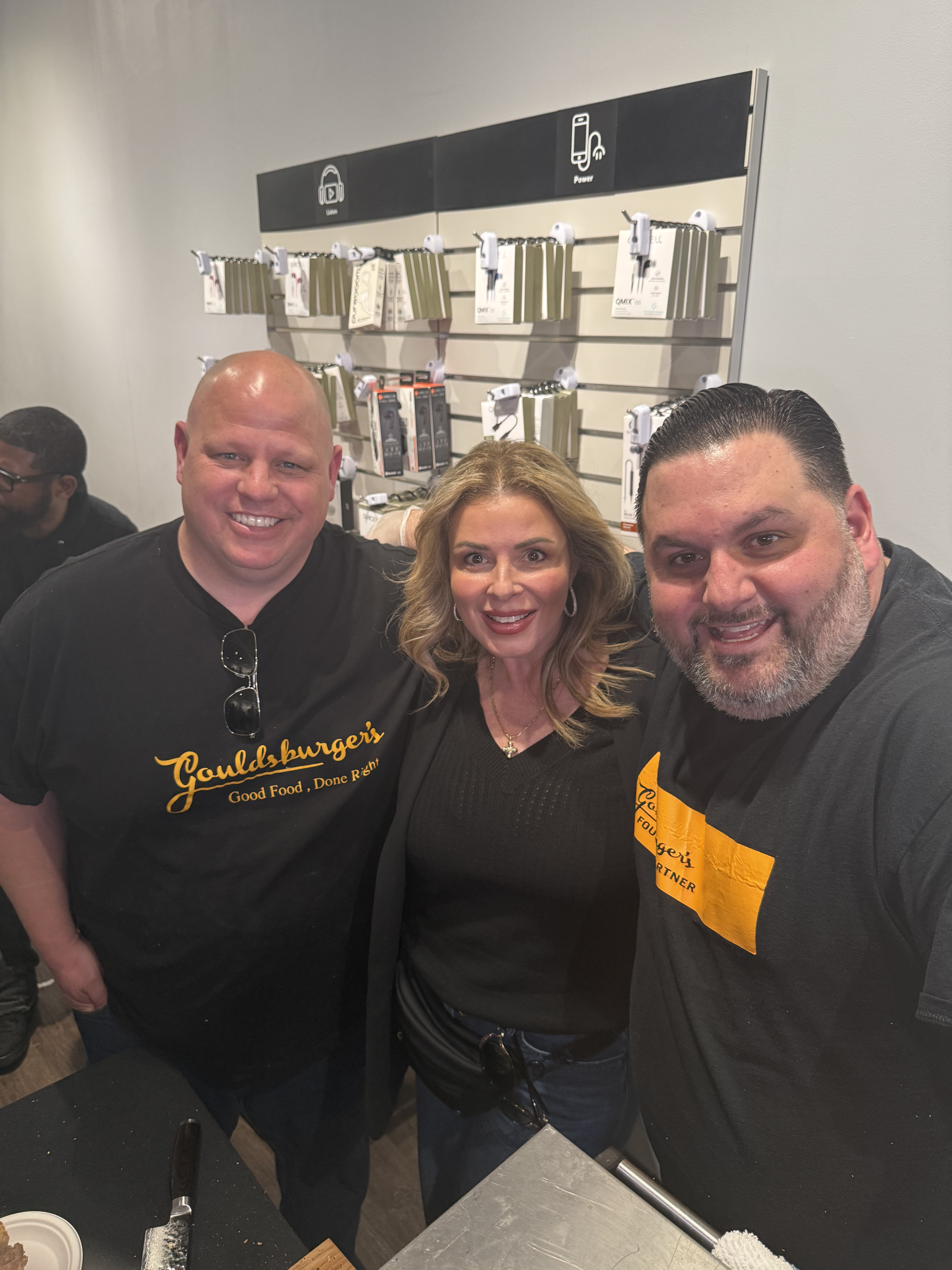 Crowd tasting cheesesteaks